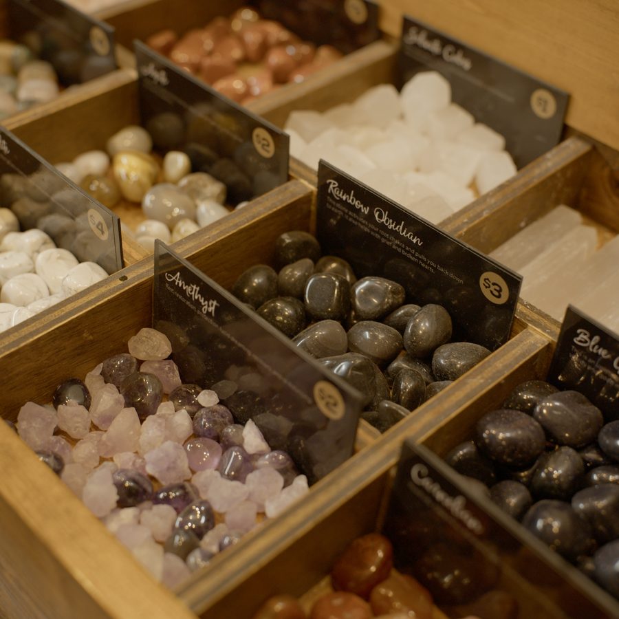 Tumbled crystals in labeled trays